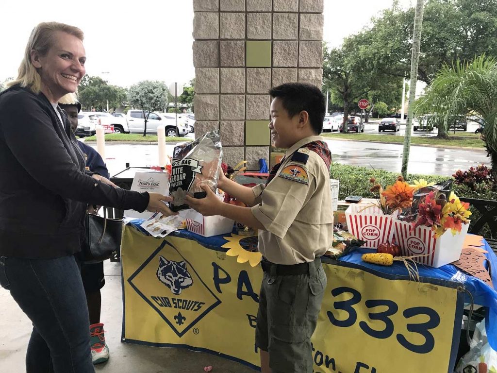 Ben Liu, from Cub Scout Pack 333 in Boca, ready to make a sale.